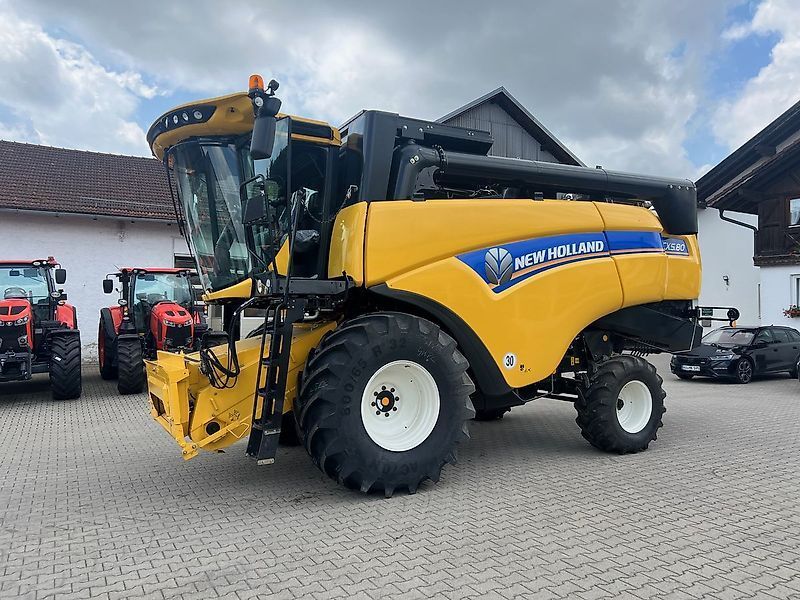 E-FARM: New Holland CX5.80 - Mähdrescher - id TYW3M3D - 225.000 € - Baujahr: 2023 - Abgelesene Motorstunden: 5,Motorleistung (PS): 258,Deutschland