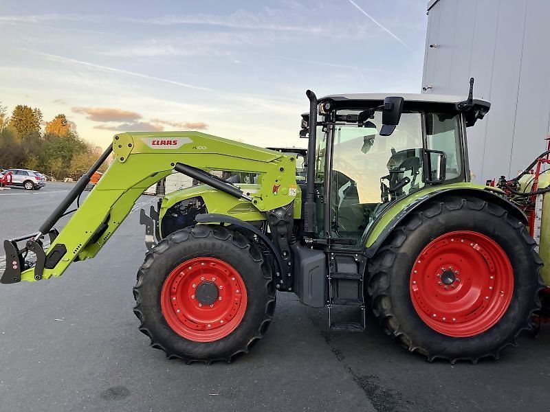 Claas axos 3.105 + fl 100 c Tractor €78,900