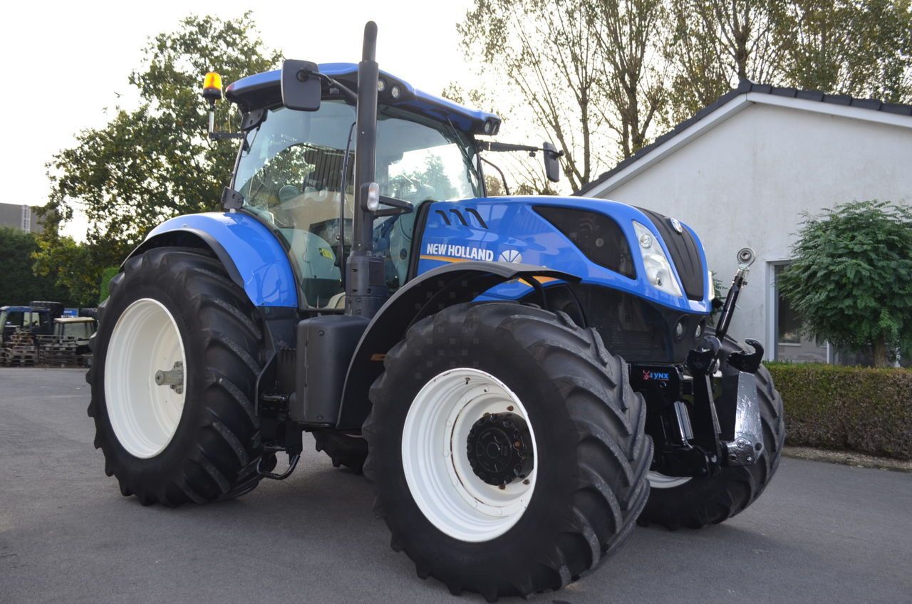E-FARM: New Holland T7.260 - Tractor - id RQB6FXV - €78,500 - Year of construction: 2016 - Engine hours: 4,683,Engine power (HP): 260,Belgium