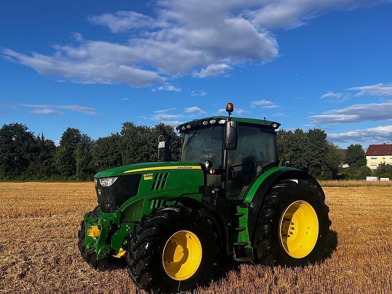 E-FARM: John Deere 6215 R - Tractor - id QZQWWHK - €105,000 - Year of construction: 2014 - Engine hours: 2,014,Engine power (HP): 214,Germany