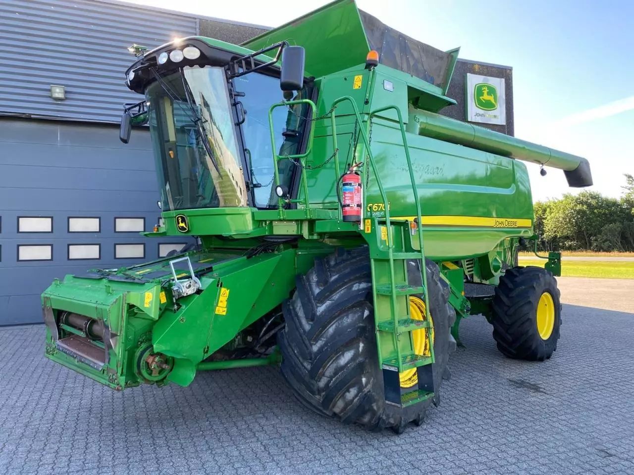 E-FARM: John Deere C 670 - Moissoneuse-batteuse - id 7RCUMVE - 67 011 € - Année: 2009 - Danemark