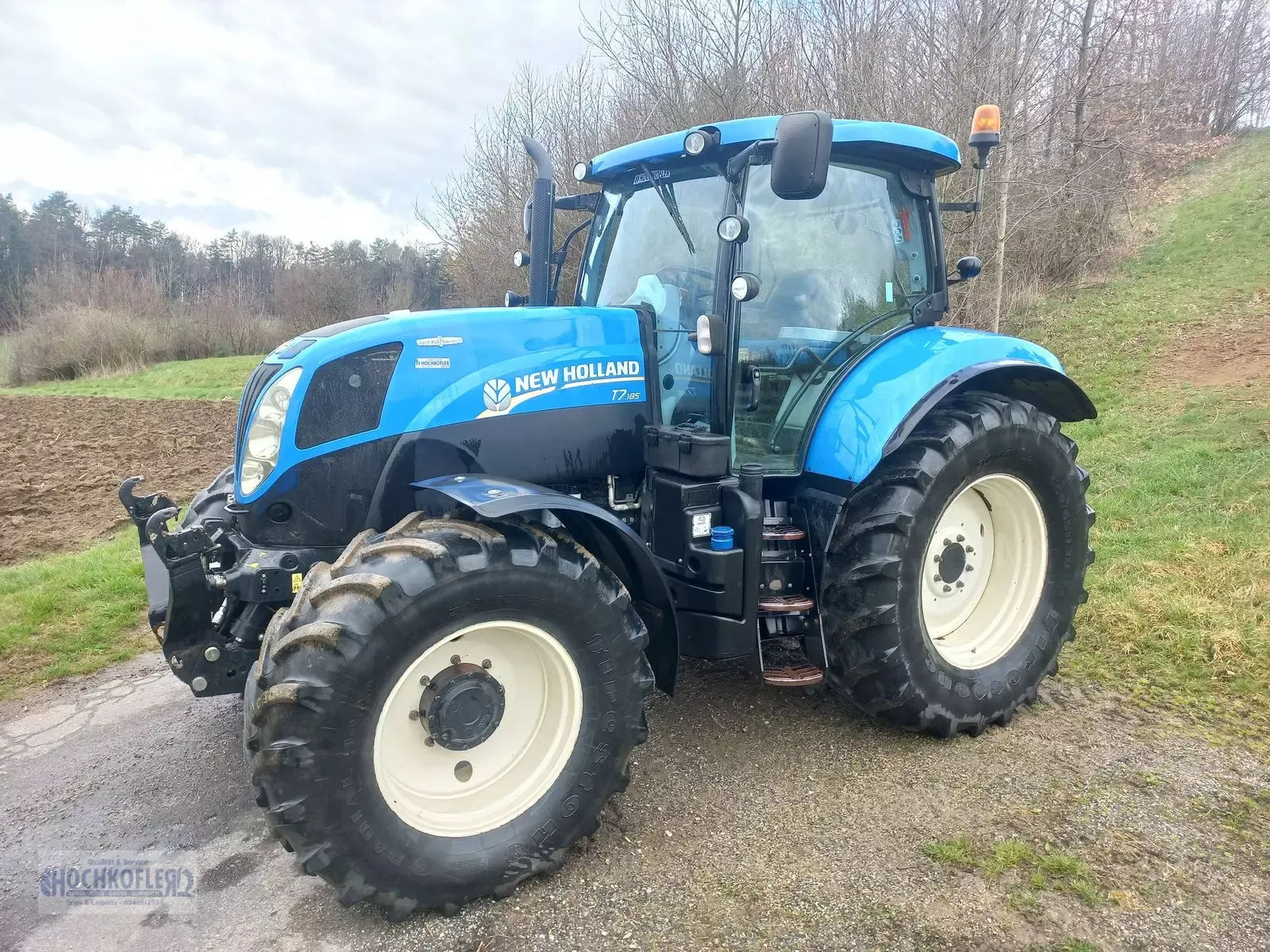 E-FARM: New Holland T7.185 - Tracteur - id 8RNXSQQ - 66 372 € - Année: 2013 - Lecture du nombre d'heure: 6 695,Puissance du moteur (chevaux): 188,Autriche