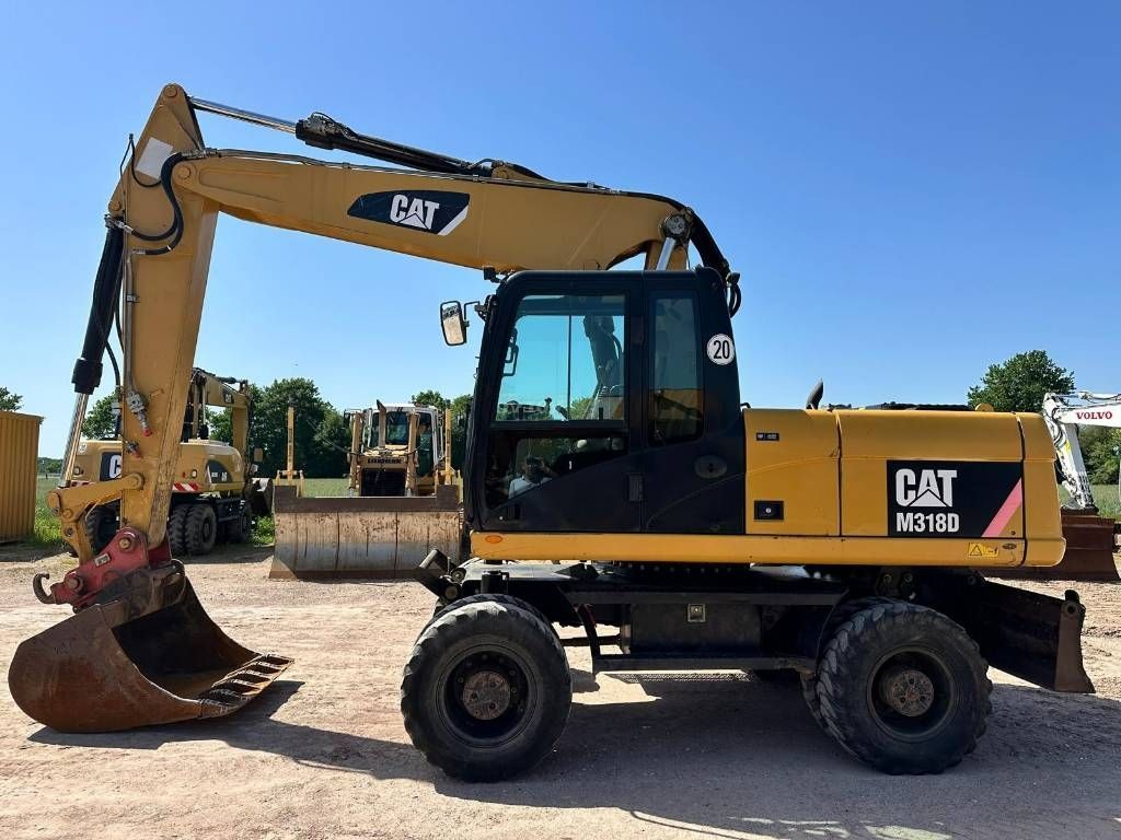 Caterpillar m 318 d new tires top zustand german machine ! Koparka kołowa 55 000 €