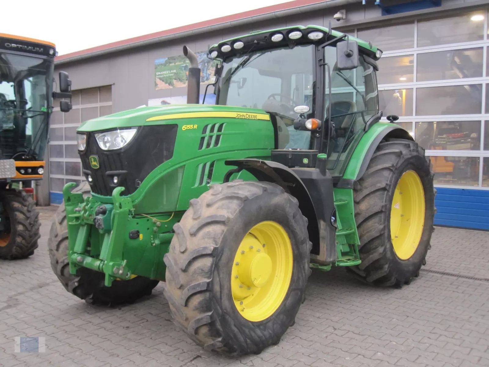 E-FARM: John Deere 6155 R - Tractor - id 851UV69 - 65.000 EUR - Anul: 2016 - Citeste ore: 5.160,Muterea motorului: 155,Germania