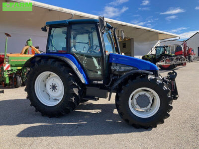 E-FARM: New Holland TL100 - Τρακτέρ - id SAY56PH - 37.080 € - Χρονία: 2000 - Μετρητής ωρών: 3.880,Ισχύς κινητήρα: 100,Αυστρία