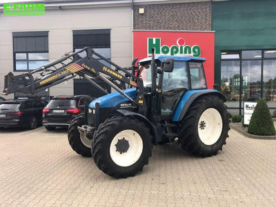 E-FARM: New Holland TM115 - Tractor - id FD1BKUS - €31,000 - Year of construction: 1999 - Engine hours: 11,102,Engine power (HP): 110,Germany