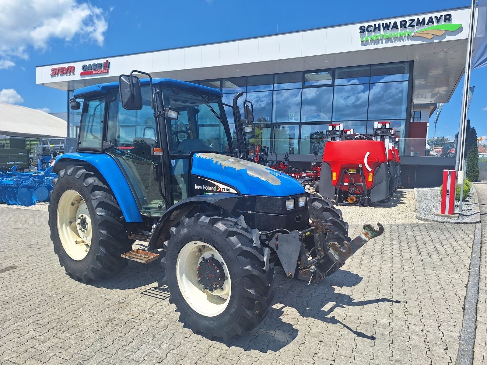 E-FARM: New Holland TL 80 - Tractor - id JE6HUFR - 22.853 € - Año: 2003 - Horas: 4655,Potencia del motor: 75,Austria