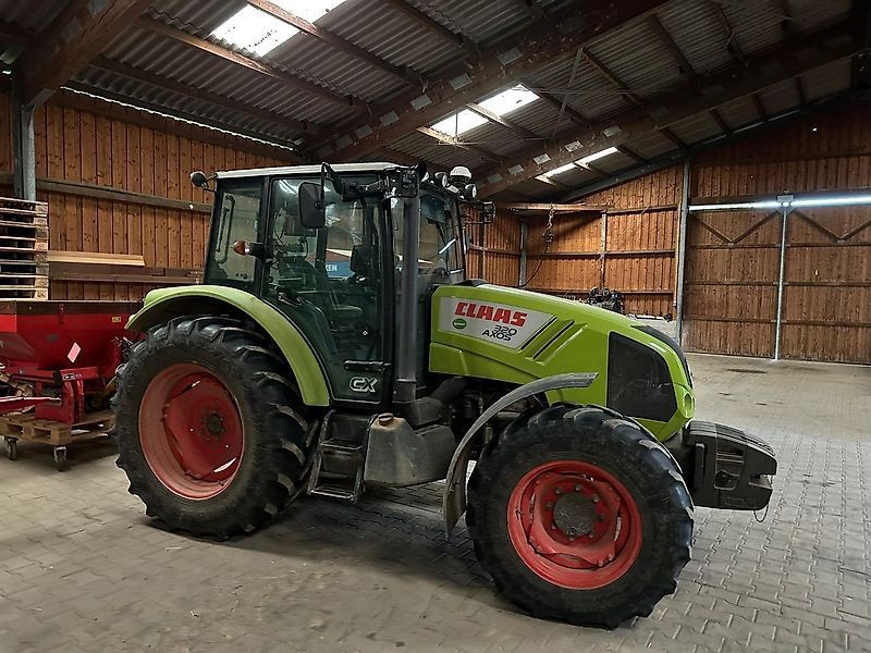 E-FARM: Claas Axos 320 CX - Tractor - id VWQ7DXF - €34,454 - Year of construction: 2011 - Engine hours: 2,250,Engine power (HP): 86,Germany