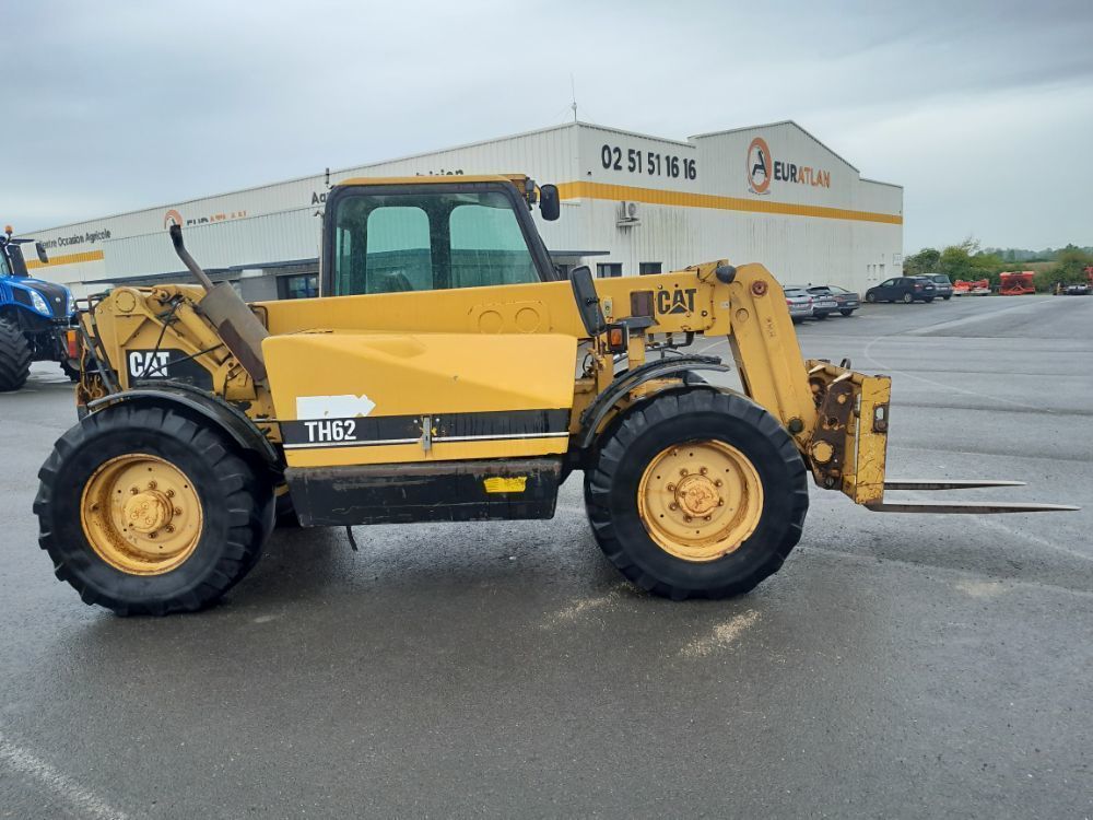 E-FARM: Caterpillar th62 - Telehandler - id SXDABUK - €15,000 - Year of construction: 1996 - Engine hours: 7,200,France