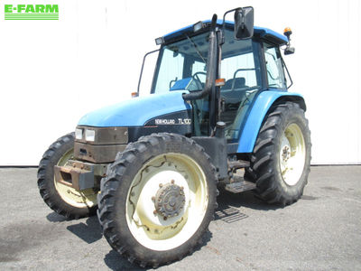 E-FARM: New Holland TL100 - Tractor - id NTHUUBX - €20,800 - Year of construction: 2001 - Engine hours: 7,389,Engine power (HP): 100,France