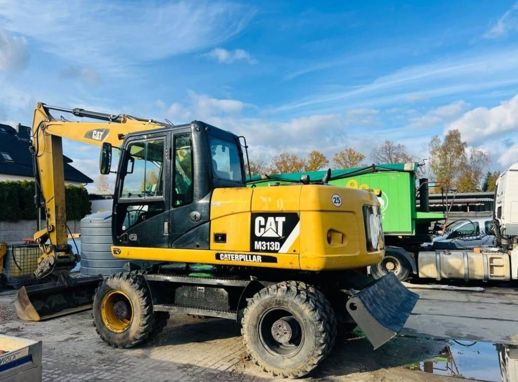 Caterpillar m313d Koparka kołowa 43 384 €