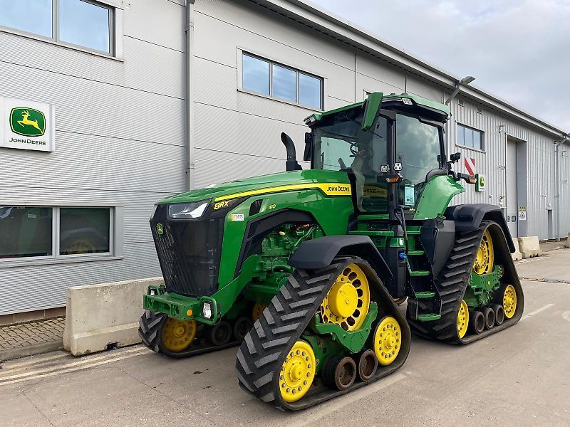 E-FARM: John Deere 8RX 410 - Trattore - id Q8JYR6G - 293.569 € - Anno di costruzione: 2021 - Ore: 2.580,Regno Unito