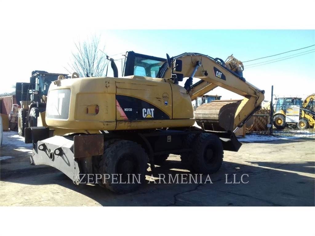 Caterpillar m313d Excavadora de ruedas 88.000 €