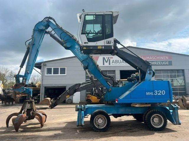 E-FARM: Fuchs mhl 320 umschlagbagger **bj. 2008 *18349h - Pelleteuse sur roue - id 6RHHAFL - 45 900 € - Année: 2008 - Allemagne
