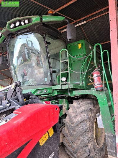 E-FARM: John Deere T560 - Combină de recoltat - id YHAQ6GK - 195.000 EUR - Anul: 2021 - Citeste ore: 1.500,Muterea motorului: 330,Franța