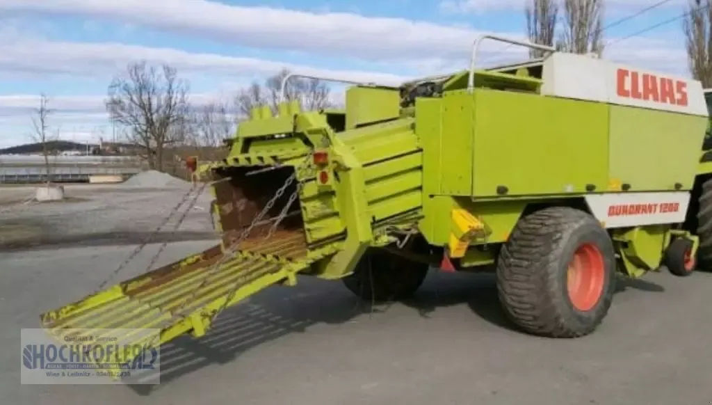 E-FARM: Claas Quadrant 1200 - Balownica - id TXKLB7G - 9083 € - Rok produkcji: 1990 - Austria