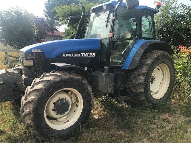 E-FARM: New Holland TM125 - Tractor - id LAB1UXB - €25,000 - Year of construction: 2003 - Engine hours: 7,200,Engine power (HP): 125,France