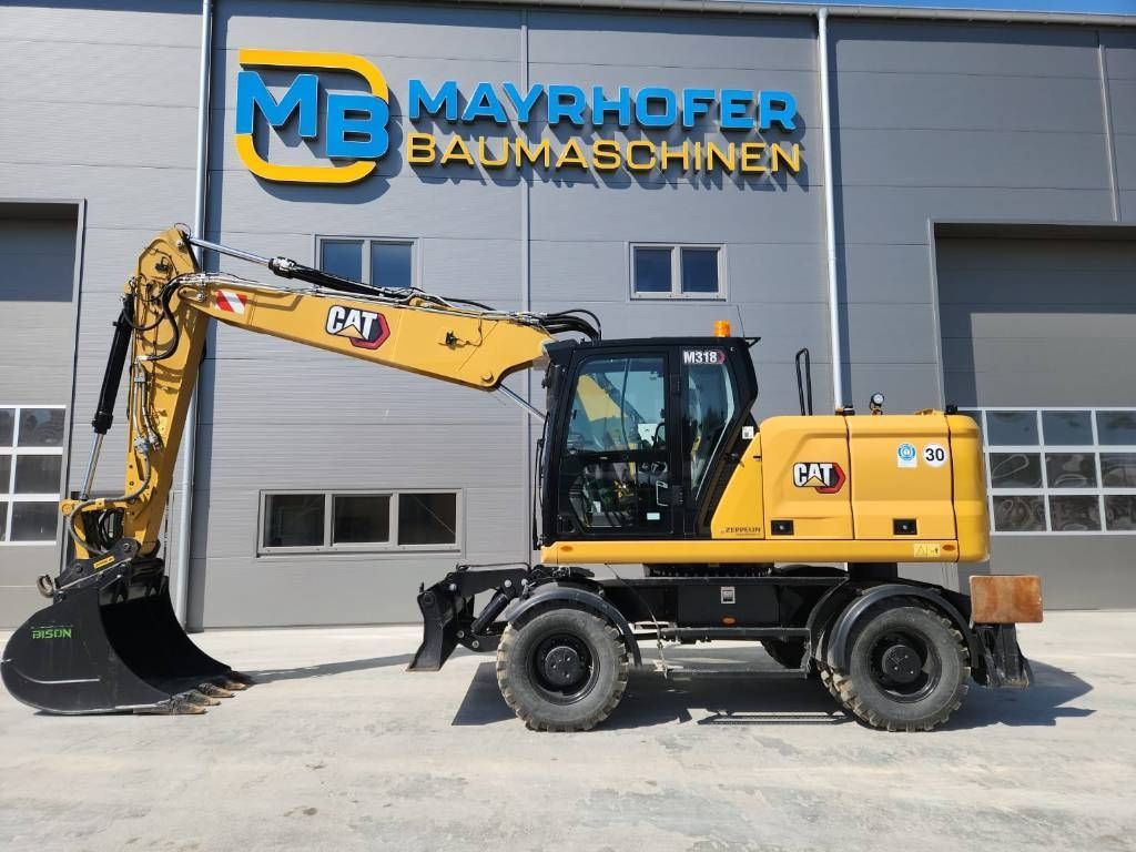 Caterpillar m 318 Wheeled excavator €199,000