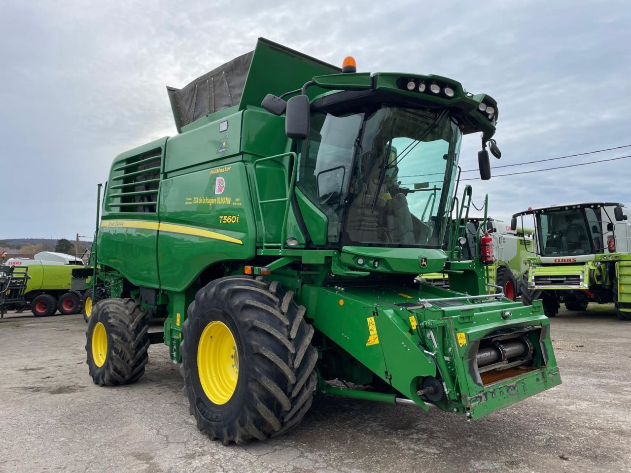 John Deere T 560 i Moissoneuse-batteuse 198 000 €