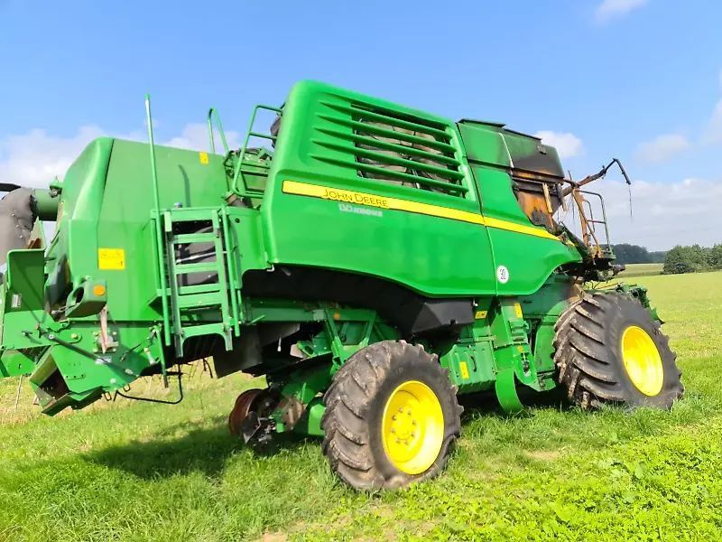 John Deere T 560 HM Kombájn