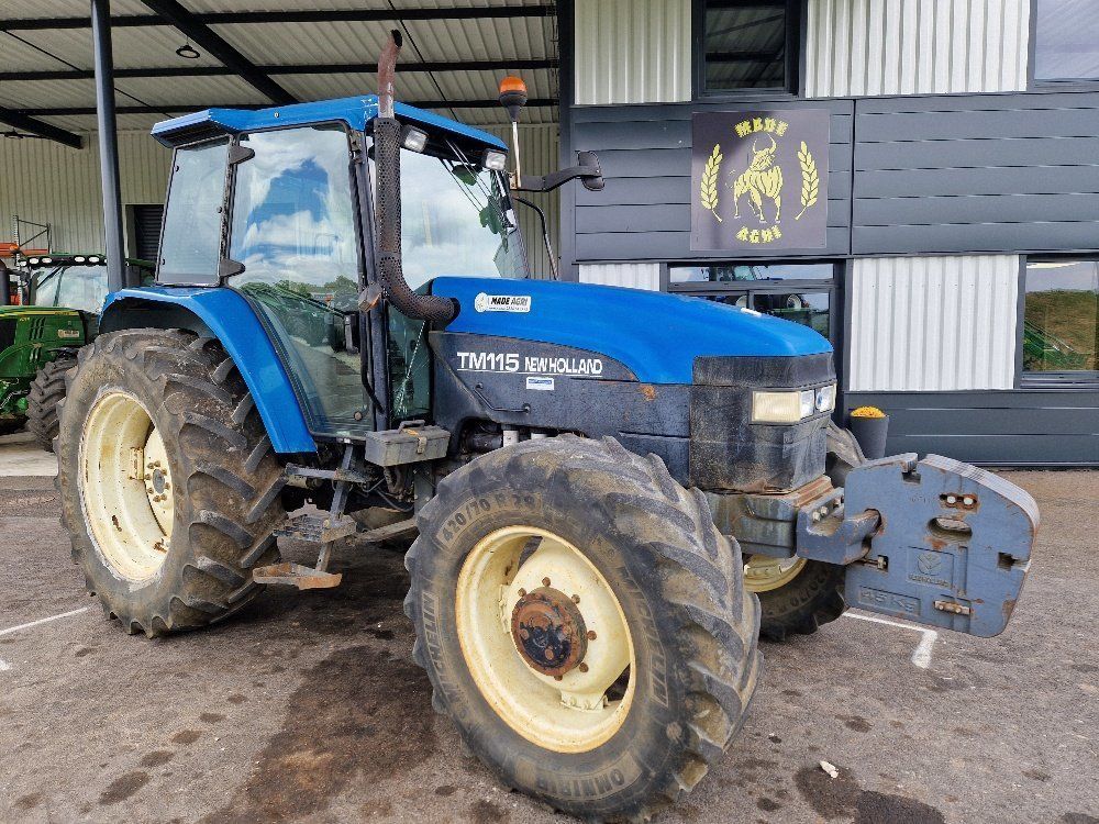 E-FARM: New Holland TM115 - Trattore - id NAWVTNG - 16.000 € - Anno di costruzione: 2000 - Ore: 10.590,Potenza del motore: 115,Francia