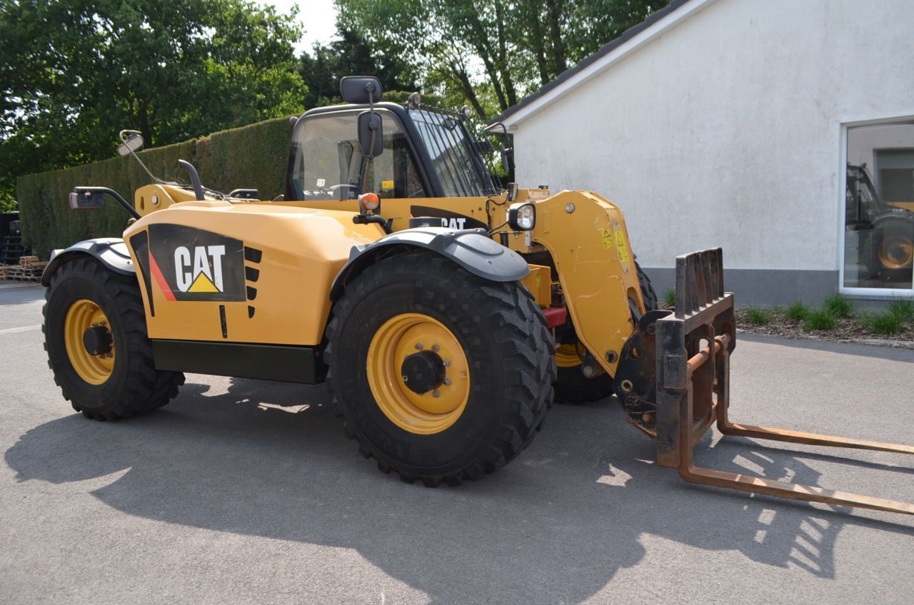 E-FARM: Caterpillar th407 - Teleskopický nakladač - id FYE3VIN - 39 500 € - Rok výroby: 2010 - Hodiny motoru: 3 593,Belgie