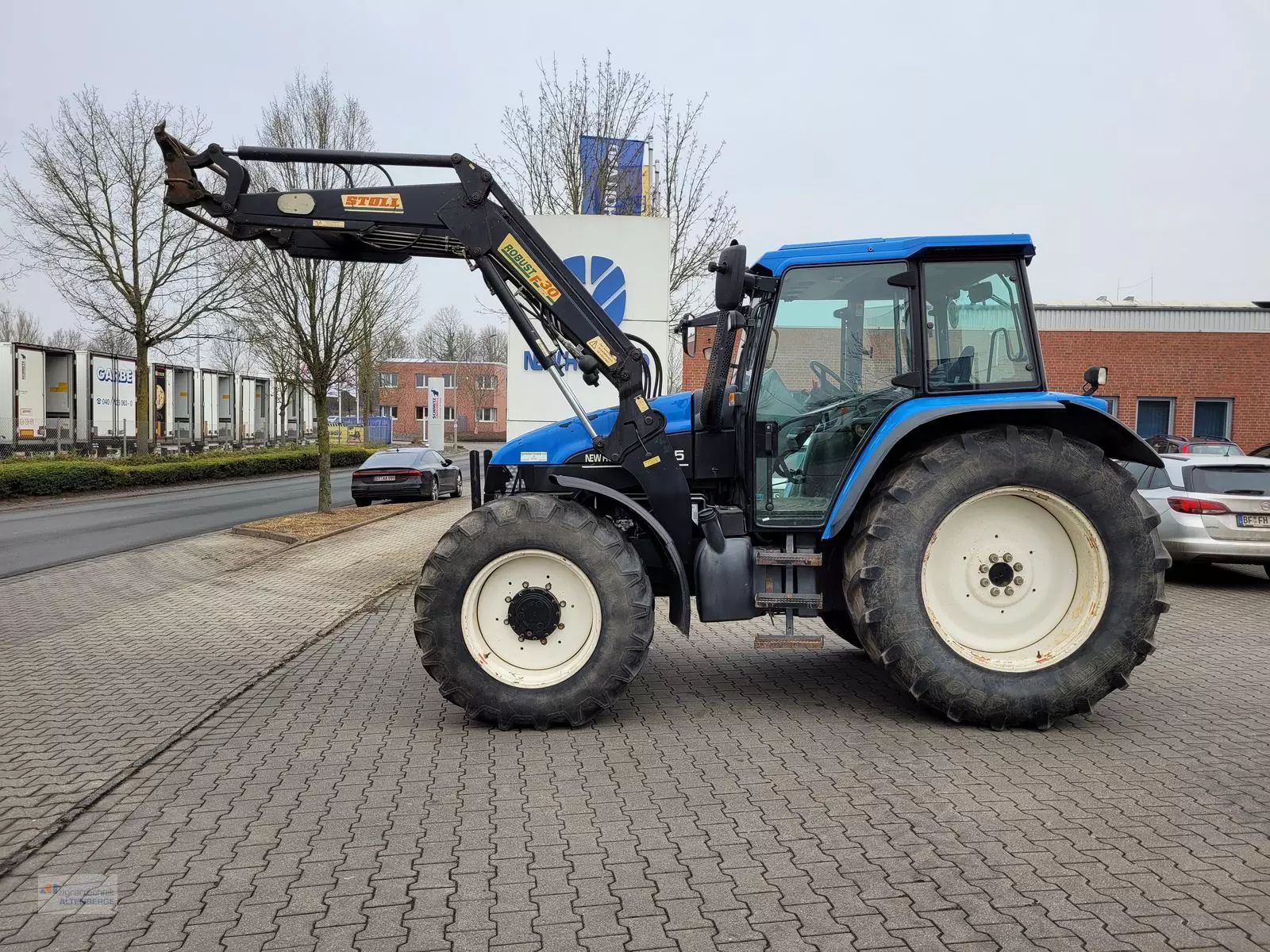 E-FARM: New Holland TS115 - Tractor - id PBZKJNL - 28.487 € - Año: 2003 - Horas: 9455,Potencia del motor: 115,Alemania