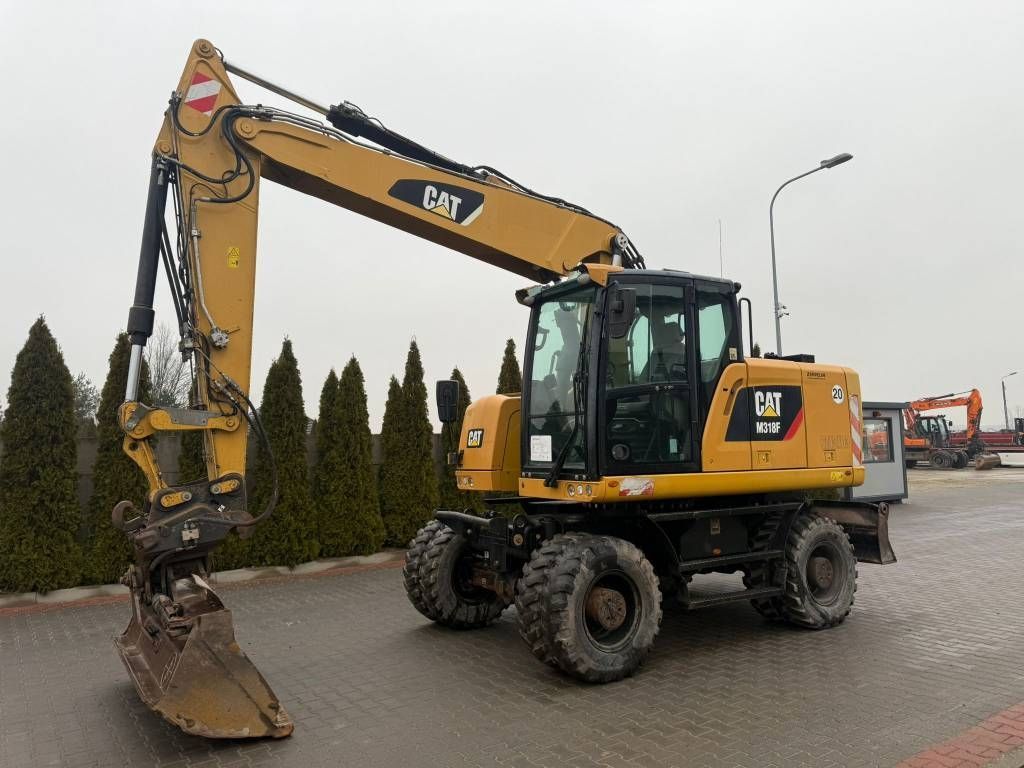 Caterpillar 318 Wheeled excavator €64,832