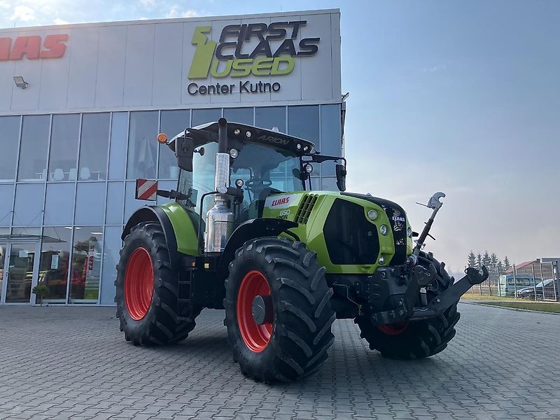 E-FARM: Claas Arion 650 - Traktor - id NGGCCEN - 128.787 € - Baujahr: 2021 - Abgelesene Motorstunden: 1.961,Motorleistung (PS): 175,Polen