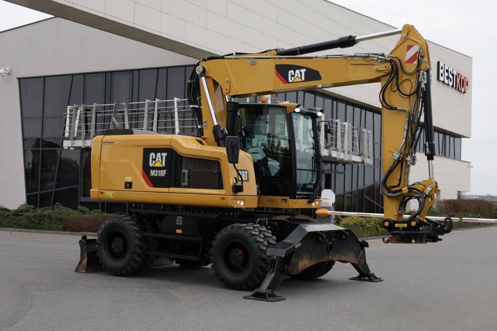 Caterpillar m 318 f Wheeled excavator €87,500