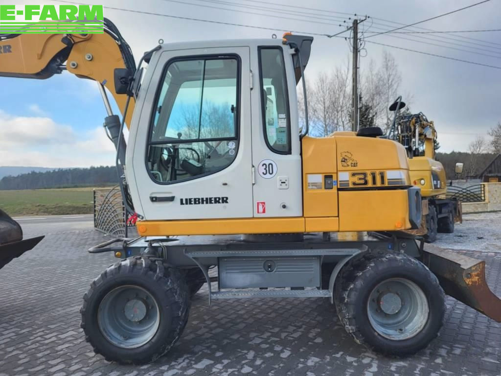 Liebherr 311 excavator_wheeled 48 518 €