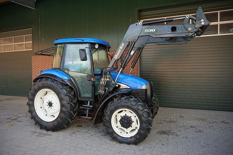 E-FARM: New Holland TD80 D - Tracteur - id QJ7PQ7H - 23 950 € - Année: 2004 - Lecture du nombre d'heure: 5 280,Puissance du moteur (chevaux): 80,Allemagne