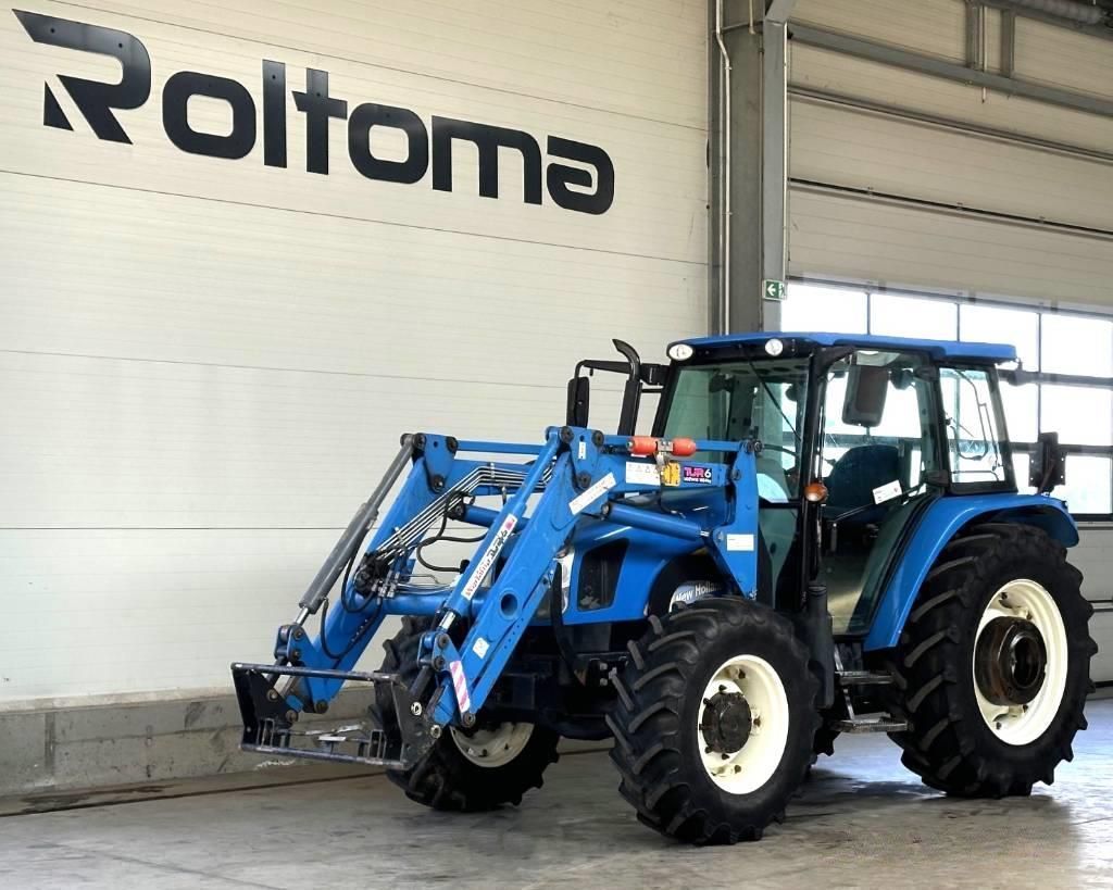 E-FARM: New Holland T5040 - Traktor - id HIKF4LA - 30.166 € - Baujahr: 2012 - Abgelesene Motorstunden: 5.896,Motorleistung (PS): 88,Polen