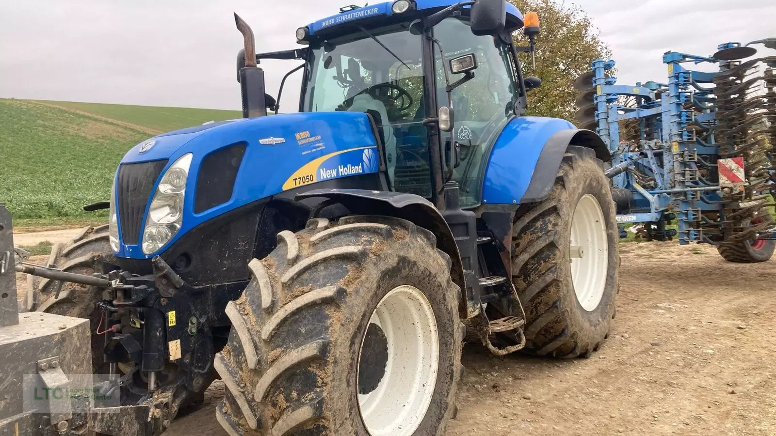 E-FARM: New Holland T7050 - Tractor - id LENIEVZ - 55.752 EUR - Anul: 2011 - Citeste ore: 7.998,Muterea motorului: 195,Austria