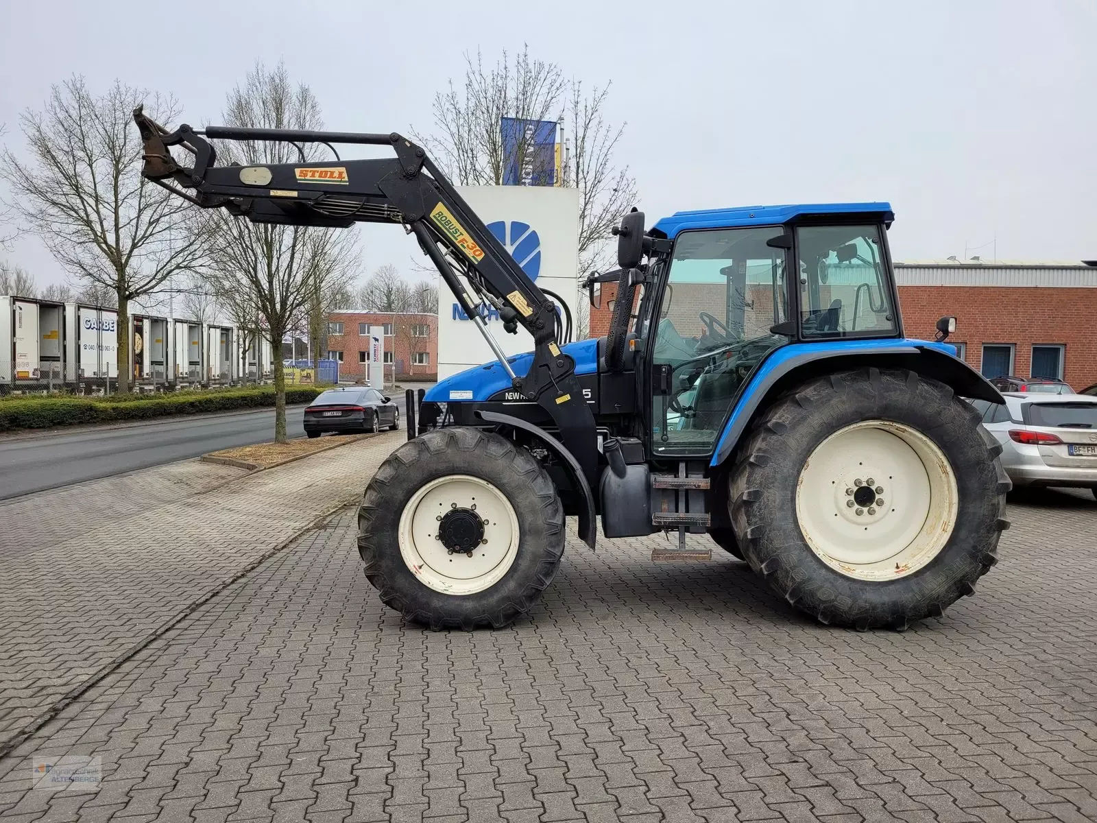 E-FARM: New Holland TS115 - Tractor - id PBZKJNL - €28,487 - Year of construction: 2003 - Engine hours: 9,455,Engine power (HP): 115,Germany