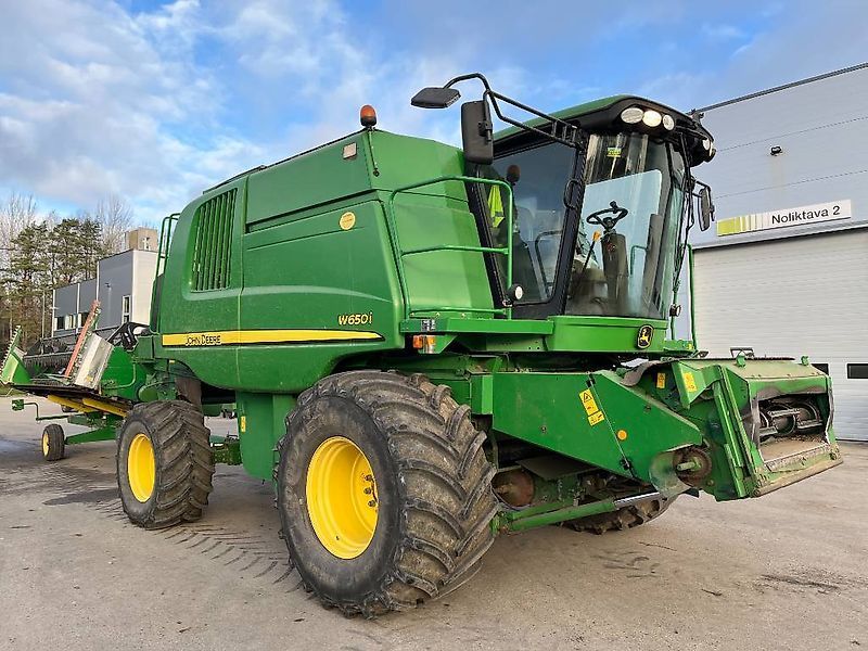 E-FARM: John Deere W 650 i - Cosechadora - id DC4RHUV - 61.500 € - Año: 2009 - Horas: 3020,Potencia del motor: 341,Letonia
