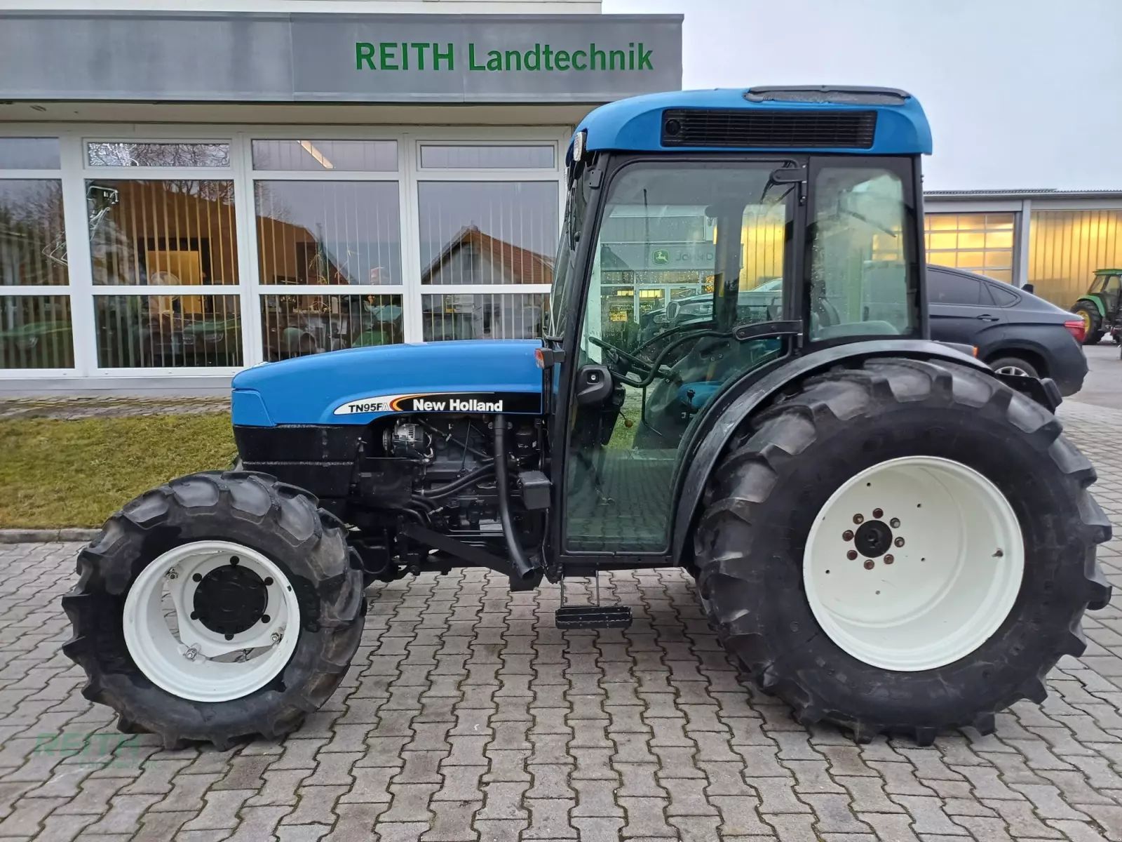 New Holland TN 95 F Traktor