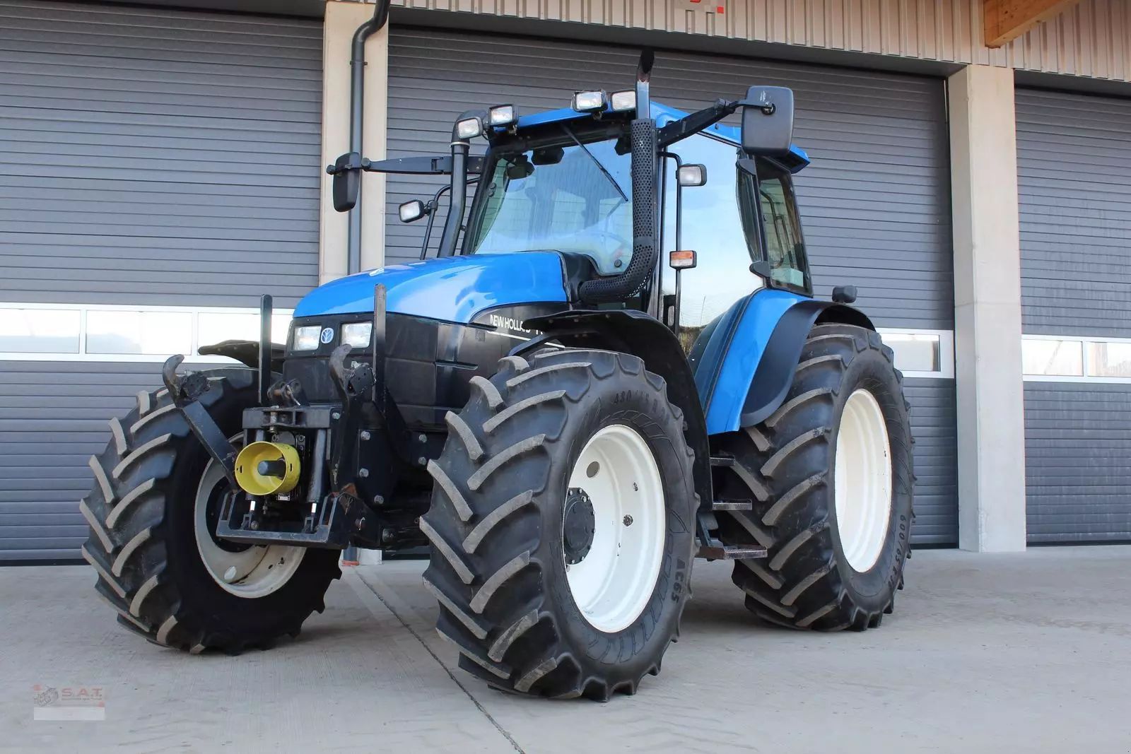 E-FARM: New Holland TS115 - Tractor - id YBSFAQZ - Year of construction: 2003 - Engine hours: 5,500,Engine power (HP): 120,Austria