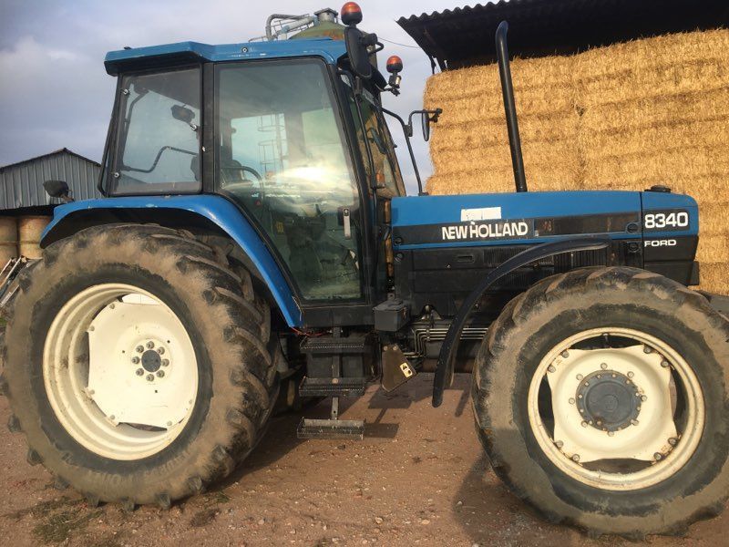 E-FARM: New Holland 8340 - Tractor - id FJAWYKZ - €15,000 - Year of construction: 1997 - Engine hours: 12,700,Engine power (HP): 125,France