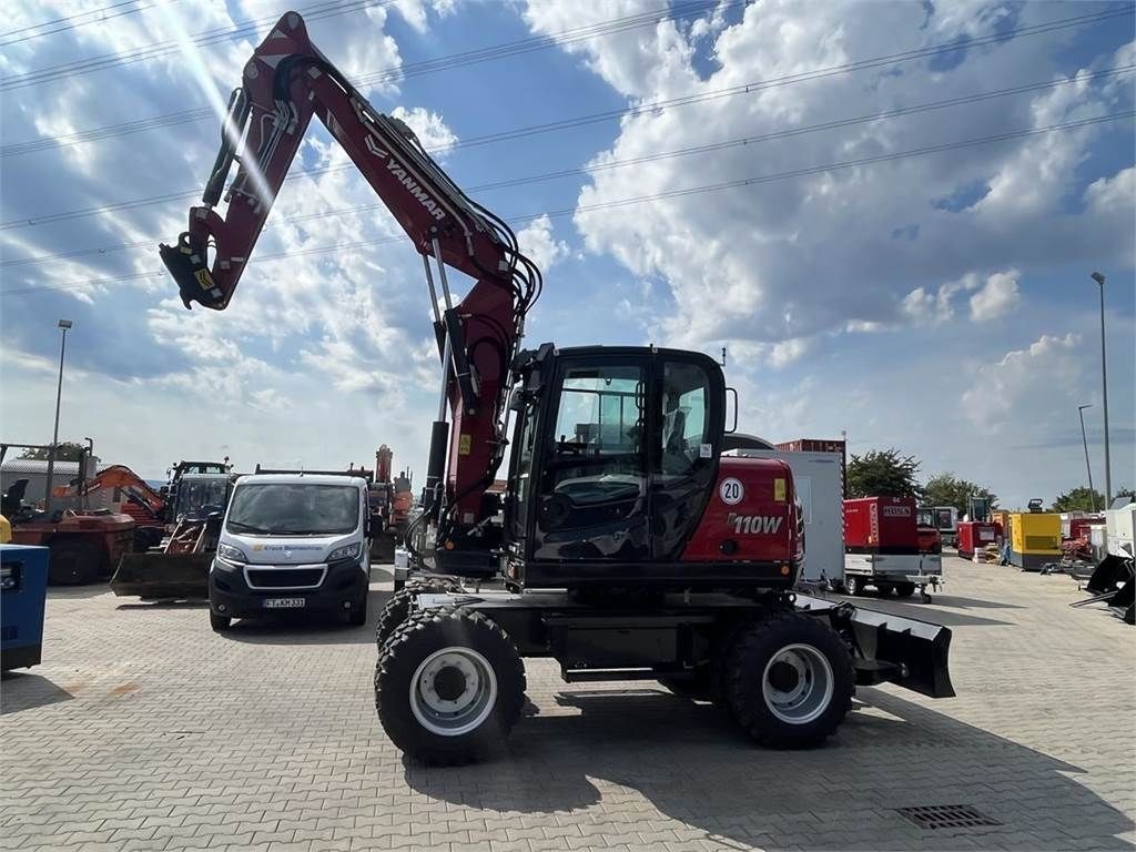 Yanmar b110w Колесный экскаватор