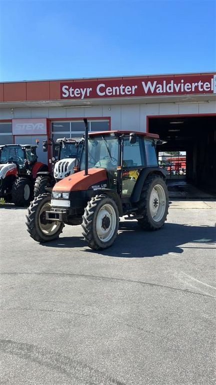E-FARM: New Holland L65 - Trattore - id ZXPRLZM - 20.796 € - Anno di costruzione: 1997 - Ore: 6.730,Potenza del motore: 65,Austria