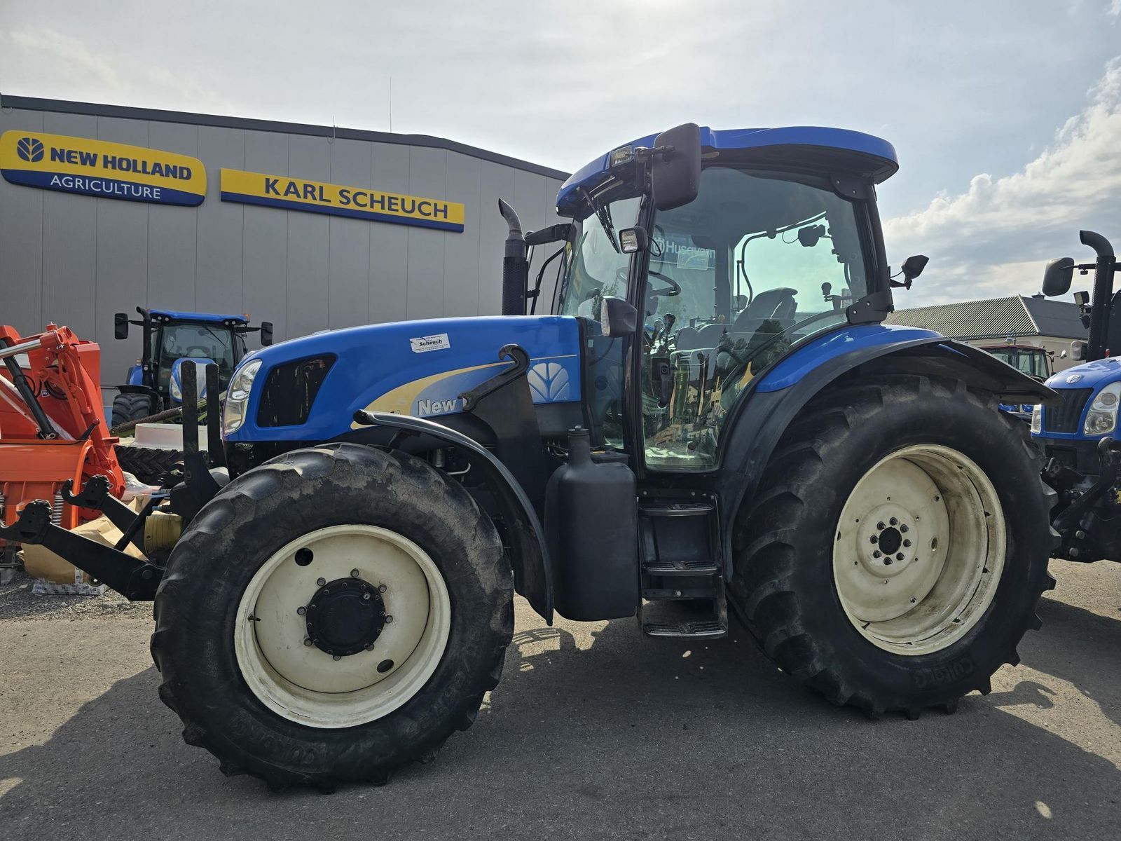 E-FARM: New Holland TS115A - Tractor - id PJ39Q8U - 50.354 EUR - Anul: 2005 - Citeste ore: 5.950,Muterea motorului: 116,Austria