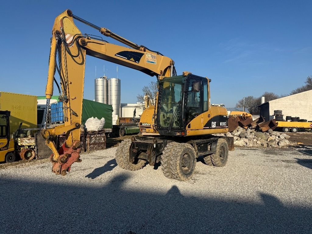 Caterpillar m 313 c Τροχοφόρος εκσκαφέας 32.000 €