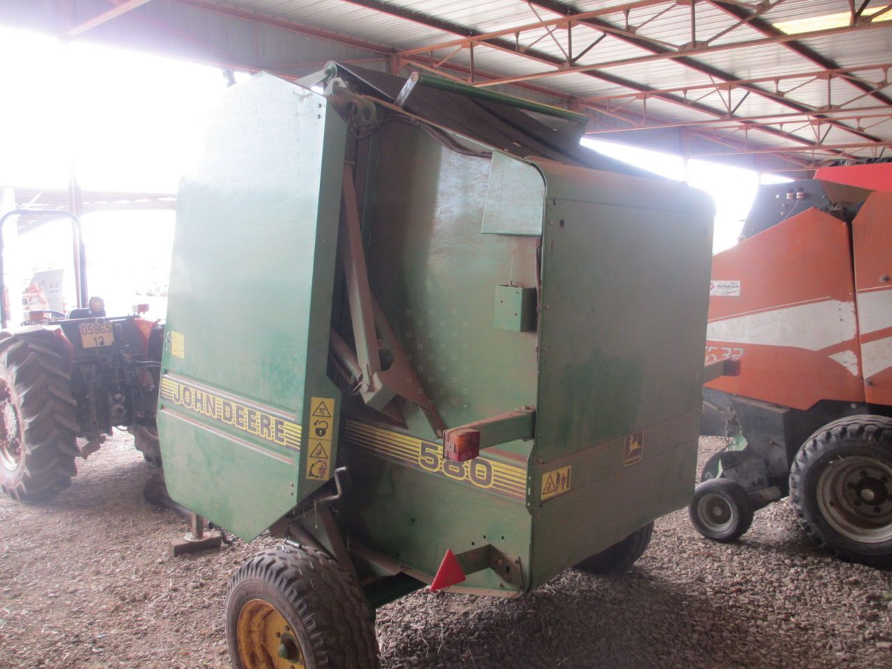 John Deere 580 Presă de balotat 4.000 EUR