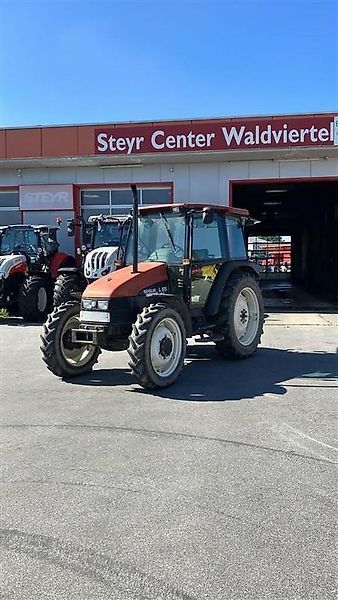 E-FARM: New Holland L65 - Tractor - id ZXPRLZM - €20,796 - Year of construction: 1997 - Engine hours: 6,730,Engine power (HP): 65,Austria