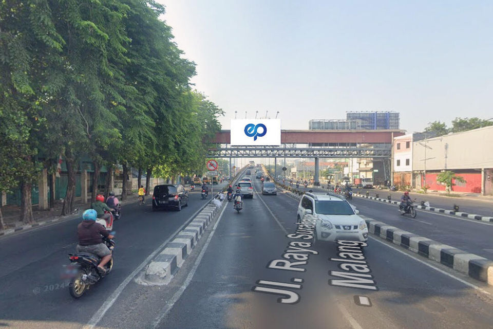 Billboard at JPO JI. Wonokromo, Surabaya