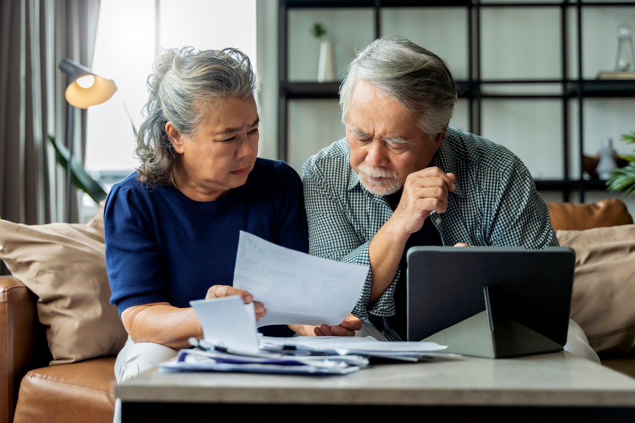 Couple reviewing financial documents