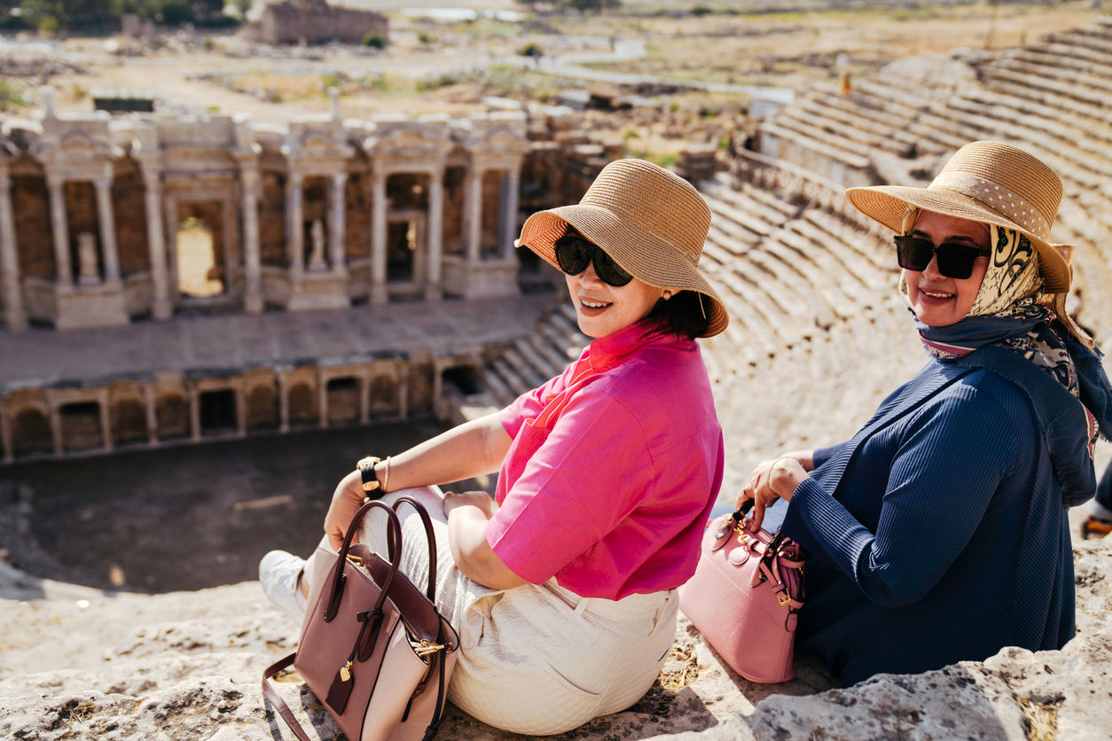 Older women exploring the ruins of a Roman amphitheater