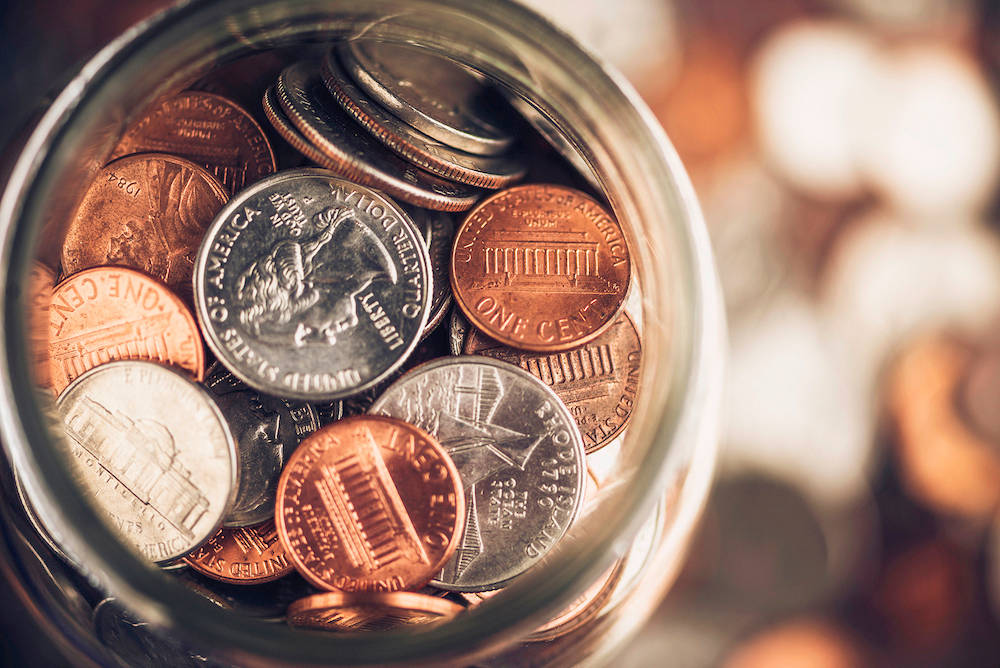 glass jar full of coins