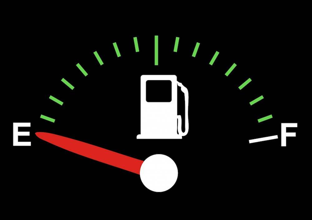 car fuel gauge with the needle on empty